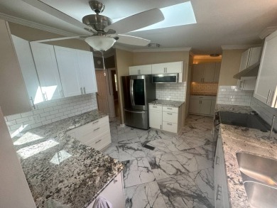 Lot Rent $1342.00 Monthly  Total square footage under A/C is on Del Tura Golf and Country Club in Florida - for sale on GolfHomes.com, golf home, golf lot
