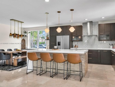 INCREDIBLE BACKYARD, FULLY RENOVATED HOME W/ STUNNING VIEWS on Weston Hills Country Club in Florida - for sale on GolfHomes.com, golf home, golf lot