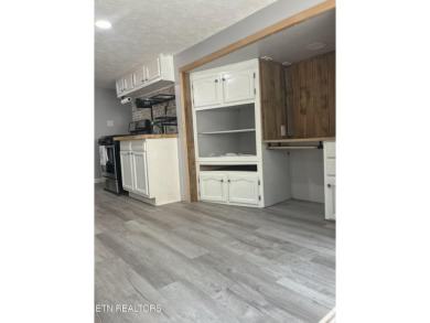 Charming 1 Bedroom Retreat in Holiday Out RV Park on creek with on Lake Tansi Village Country Club in Tennessee - for sale on GolfHomes.com, golf home, golf lot
