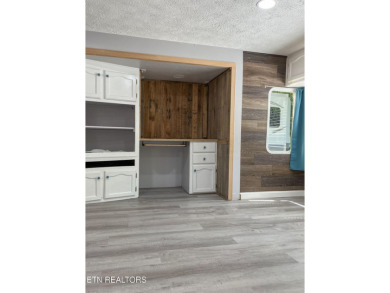 Charming 1 Bedroom Retreat in Holiday Out RV Park on creek with on Lake Tansi Village Country Club in Tennessee - for sale on GolfHomes.com, golf home, golf lot