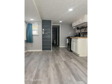 Charming 1 Bedroom Retreat in Holiday Out RV Park on creek with on Lake Tansi Village Country Club in Tennessee - for sale on GolfHomes.com, golf home, golf lot