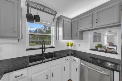 Adorable B-Plan corner unit-the largest model in the on The American Golf Club in Florida - for sale on GolfHomes.com, golf home, golf lot