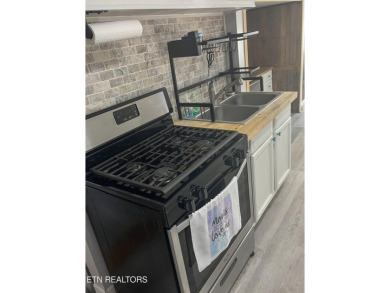 Charming 1 Bedroom Retreat in Holiday Out RV Park on creek with on Lake Tansi Village Country Club in Tennessee - for sale on GolfHomes.com, golf home, golf lot
