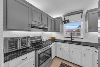 Adorable B-Plan corner unit-the largest model in the on The American Golf Club in Florida - for sale on GolfHomes.com, golf home, golf lot