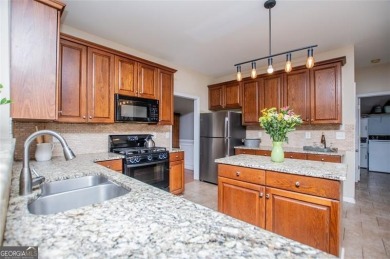 Move-in ready with BRAND NEW CARPET, this spacious 4-bedroom, 2 on Creekside Golf and Country Club in Georgia - for sale on GolfHomes.com, golf home, golf lot