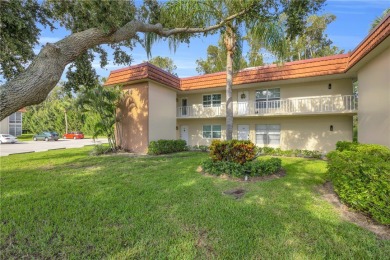 Adorable B-Plan corner unit-the largest model in the on The American Golf Club in Florida - for sale on GolfHomes.com, golf home, golf lot