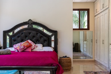 The villa consists of a main house and guesthouse, and is built on Bahia Principe Riviera Maya Golf Course in  - for sale on GolfHomes.com, golf home, golf lot