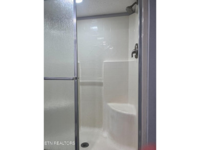 Charming 1 Bedroom Retreat in Holiday Out RV Park on creek with on Lake Tansi Village Country Club in Tennessee - for sale on GolfHomes.com, golf home, golf lot