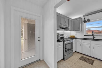 Adorable B-Plan corner unit-the largest model in the on The American Golf Club in Florida - for sale on GolfHomes.com, golf home, golf lot