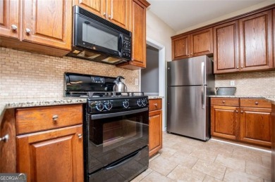 Move-in ready with BRAND NEW CARPET, this spacious 4-bedroom, 2 on Creekside Golf and Country Club in Georgia - for sale on GolfHomes.com, golf home, golf lot