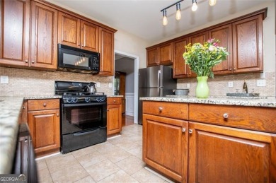 Move-in ready with BRAND NEW CARPET, this spacious 4-bedroom, 2 on Creekside Golf and Country Club in Georgia - for sale on GolfHomes.com, golf home, golf lot
