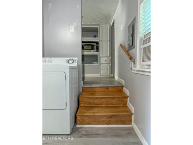 Charming 1 Bedroom Retreat in Holiday Out RV Park on creek with on Lake Tansi Village Country Club in Tennessee - for sale on GolfHomes.com, golf home, golf lot