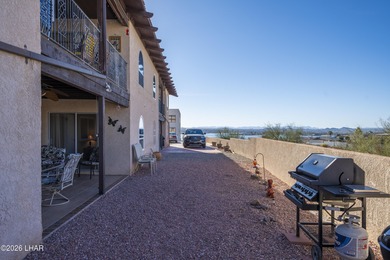 Ground-floor, single-story condo with two patios and stunning on London Bridge Golf Course in Arizona - for sale on GolfHomes.com, golf home, golf lot