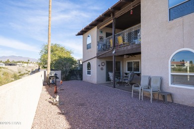 Ground-floor, single-story condo with two patios and stunning on London Bridge Golf Course in Arizona - for sale on GolfHomes.com, golf home, golf lot