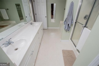 Move-in ready with BRAND NEW CARPET, this spacious 4-bedroom, 2 on Creekside Golf and Country Club in Georgia - for sale on GolfHomes.com, golf home, golf lot
