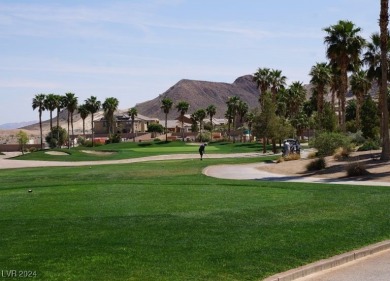 Experience resort-style elegance in this 3-bedroom, 2-bath home on Tuscany Golf Club in Nevada - for sale on GolfHomes.com, golf home, golf lot