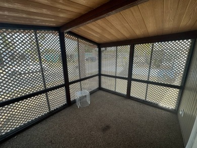 Lot Rent $1037.00    This well cared for 2-bedroom, 2-bathroom on Del Tura Golf and Country Club in Florida - for sale on GolfHomes.com, golf home, golf lot