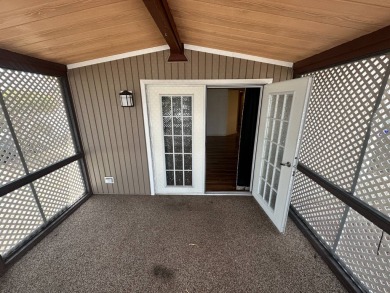Lot Rent $1037.00    This well cared for 2-bedroom, 2-bathroom on Del Tura Golf and Country Club in Florida - for sale on GolfHomes.com, golf home, golf lot
