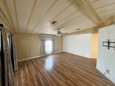 Lot Rent $1037.00    This well cared for 2-bedroom, 2-bathroom on Del Tura Golf and Country Club in Florida - for sale on GolfHomes.com, golf home, golf lot