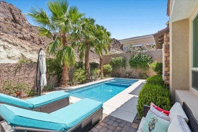 This stunning single-story home offers an open-concept design on South Shore At Lake Las Vegas in Nevada - for sale on GolfHomes.com, golf home, golf lot