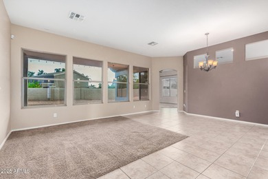 Situated on an OVERSIZED 12,150 sq. ft. lot in the prestigious on Augusta Ranch Golf Club in Arizona - for sale on GolfHomes.com, golf home, golf lot