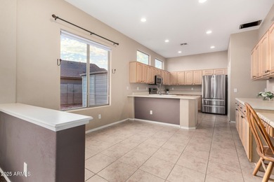 Situated on an OVERSIZED 12,150 sq. ft. lot in the prestigious on Augusta Ranch Golf Club in Arizona - for sale on GolfHomes.com, golf home, golf lot