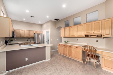 Situated on an OVERSIZED 12,150 sq. ft. lot in the prestigious on Augusta Ranch Golf Club in Arizona - for sale on GolfHomes.com, golf home, golf lot