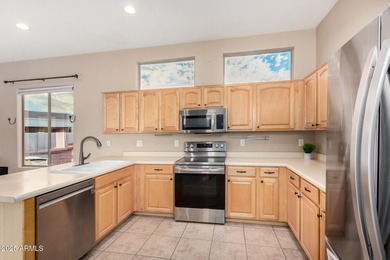 Situated on an OVERSIZED 12,150 sq. ft. lot in the prestigious on Augusta Ranch Golf Club in Arizona - for sale on GolfHomes.com, golf home, golf lot