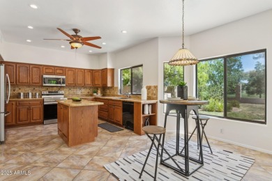 Nestled along a scenic double fairway in the heart of Ocotillo on Ocotillo Golf Resort  in Arizona - for sale on GolfHomes.com, golf home, golf lot