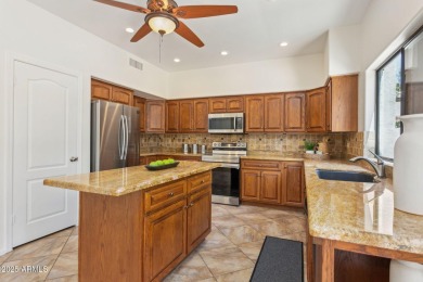 Nestled along a scenic double fairway in the heart of Ocotillo on Ocotillo Golf Resort  in Arizona - for sale on GolfHomes.com, golf home, golf lot