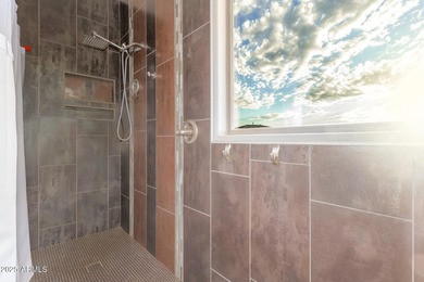 Situated on an OVERSIZED 12,150 sq. ft. lot in the prestigious on Augusta Ranch Golf Club in Arizona - for sale on GolfHomes.com, golf home, golf lot