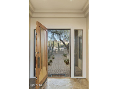 Set on a quiet cul-de-sac in gated Monument at Troon North, this on Troon North Golf Club  in Arizona - for sale on GolfHomes.com, golf home, golf lot