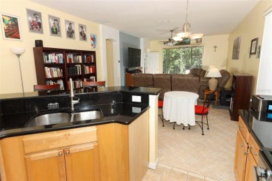 Nestled within tree-lined streets and mature landscaping in the on Victoria Hills Golf Club in Florida - for sale on GolfHomes.com, golf home, golf lot