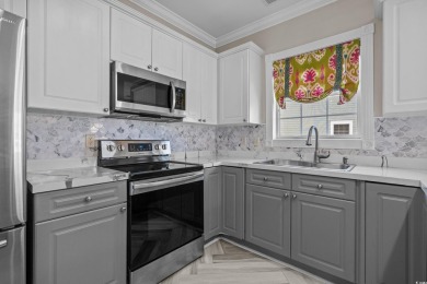 Discover this beautifully updated 3-bedroom, 2-bathroom condo on Myrtlewood Golf Course and Club  in South Carolina - for sale on GolfHomes.com, golf home, golf lot