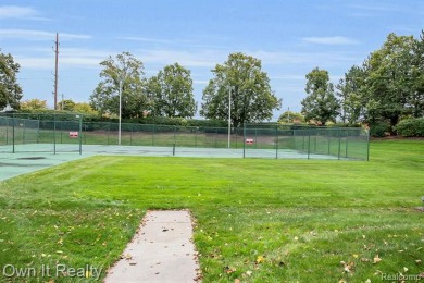 Welcome to this stunning luxury high-rise condominium boasting on Evergreen Hills Golf Course in Michigan - for sale on GolfHomes.com, golf home, golf lot
