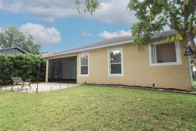 Nestled within tree-lined streets and mature landscaping in the on Victoria Hills Golf Club in Florida - for sale on GolfHomes.com, golf home, golf lot
