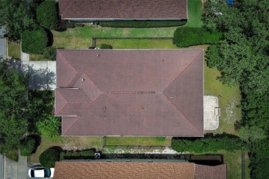 Nestled within tree-lined streets and mature landscaping in the on Victoria Hills Golf Club in Florida - for sale on GolfHomes.com, golf home, golf lot