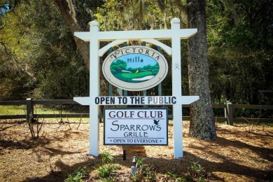 Nestled within tree-lined streets and mature landscaping in the on Victoria Hills Golf Club in Florida - for sale on GolfHomes.com, golf home, golf lot