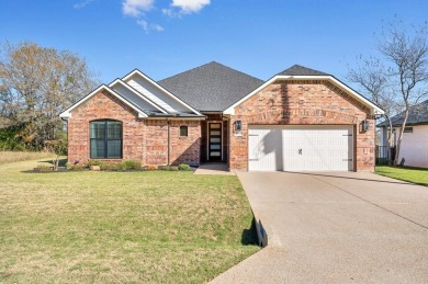 Home still smells new with beautiful views overlooking the on White Bluff Resort - New Course in Texas - for sale on GolfHomes.com, golf home, golf lot