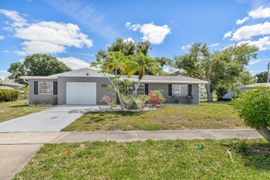 SPACIOUS AND UPDATED.  This 2 bedroom, 2 bath, 1 car garage home on Port Charlotte Golf Club in Florida - for sale on GolfHomes.com, golf home, golf lot