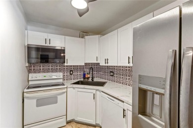 Welcome to this beautifully renovated 2 bedroom, 2 bathroom on Mangrove Bay Golf Course in Florida - for sale on GolfHomes.com, golf home, golf lot