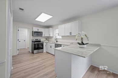 Completely renovated and move-in ready, this stunning Lake on Lake Forest Yacht and Country Club in Alabama - for sale on GolfHomes.com, golf home, golf lot