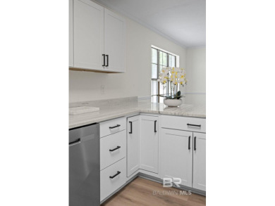 Completely renovated and move-in ready, this stunning Lake on Lake Forest Yacht and Country Club in Alabama - for sale on GolfHomes.com, golf home, golf lot