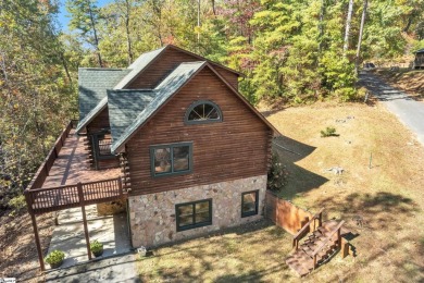 Welcome to your new cabin, ideally situated amidst serene on The Rock At Jocassee in South Carolina - for sale on GolfHomes.com, golf home, golf lot