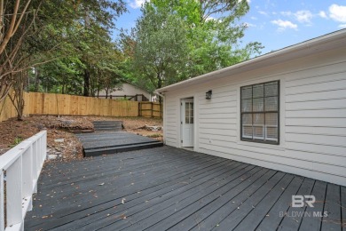 Completely renovated and move-in ready, this stunning Lake on Lake Forest Yacht and Country Club in Alabama - for sale on GolfHomes.com, golf home, golf lot