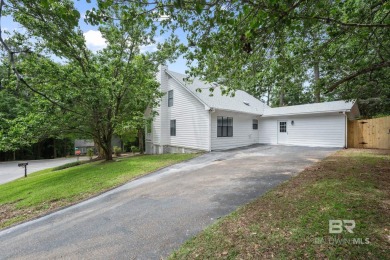 Completely renovated and move-in ready, this stunning Lake on Lake Forest Yacht and Country Club in Alabama - for sale on GolfHomes.com, golf home, golf lot