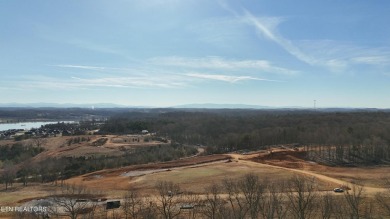 Nestled on a scenic ridge within an exclusive golf community on Tennessee National Golf Club in Tennessee - for sale on GolfHomes.com, golf home, golf lot