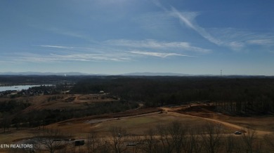 Nestled on a scenic ridge within an exclusive golf community on Tennessee National Golf Club in Tennessee - for sale on GolfHomes.com, golf home, golf lot
