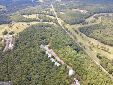 This Income-Producing Quadplex in Alpine, AL is a fantastic on Alpine Bay Resort in Alabama - for sale on GolfHomes.com, golf home, golf lot