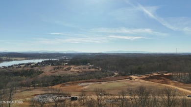 Nestled on a scenic ridge within an exclusive golf community on Tennessee National Golf Club in Tennessee - for sale on GolfHomes.com, golf home, golf lot